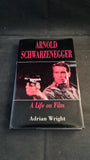 Adrian Wright - Arnold Schwarzenegger, A Life on Film, Robert Hale, 1994